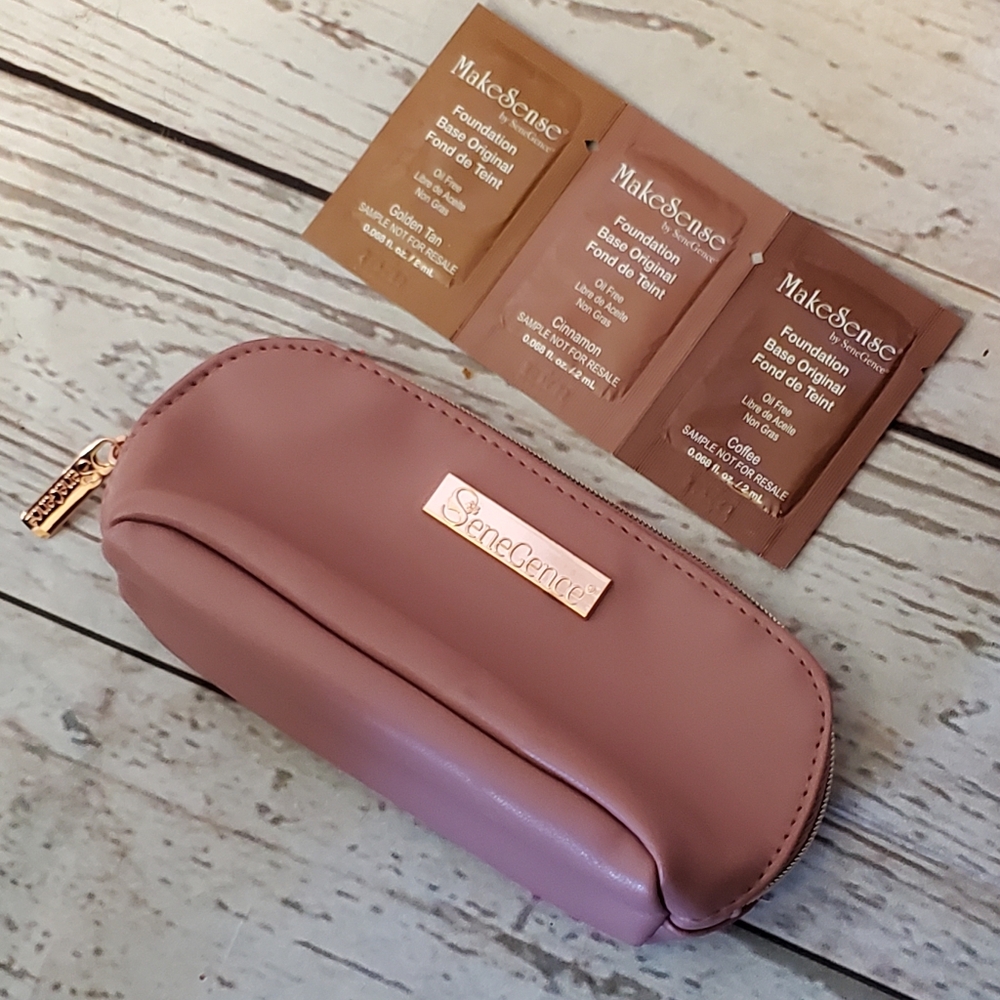 SeneGence pink vinyl makeup bag with foundation samples